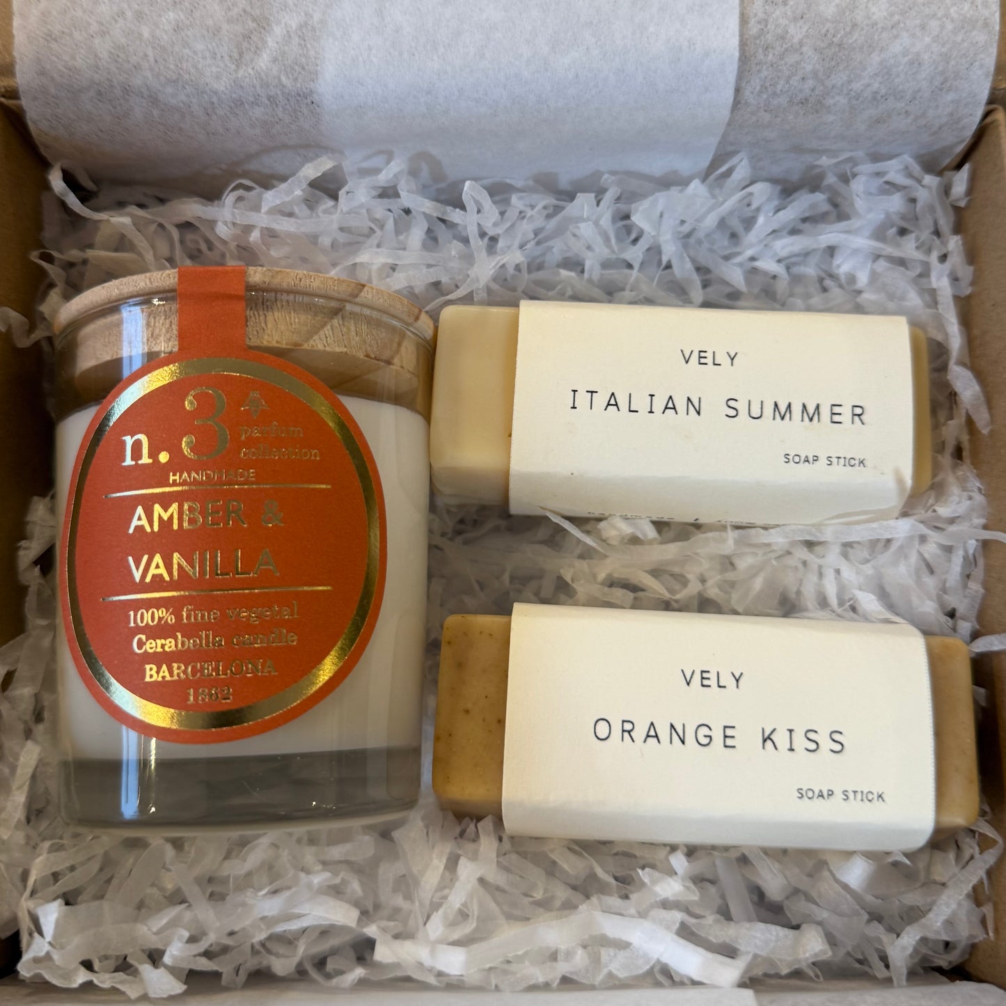 Small gift box with an Amber votive candles and two soap sticks