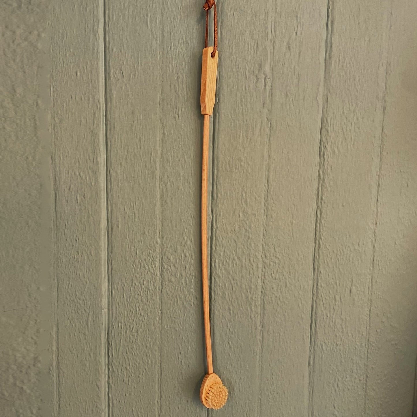 Back scratching brush hanged
