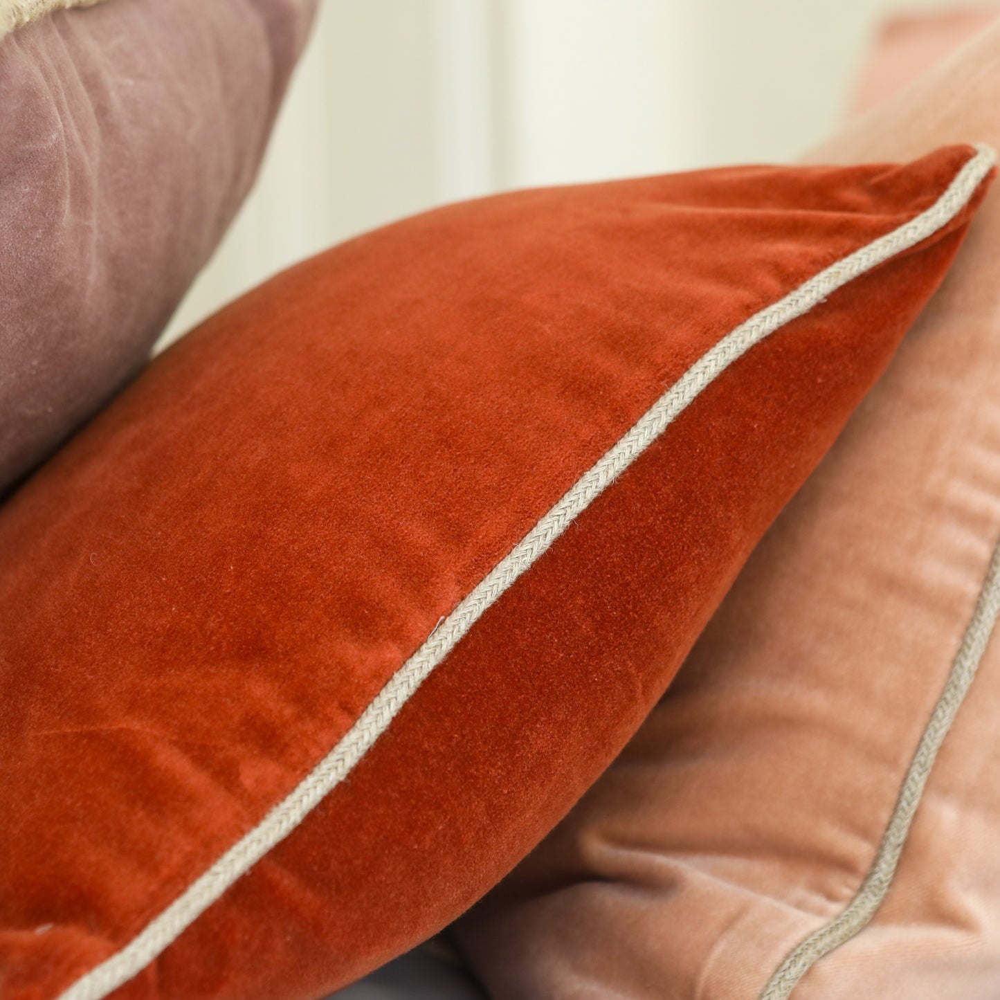 Brick coloured washable velvet cushion