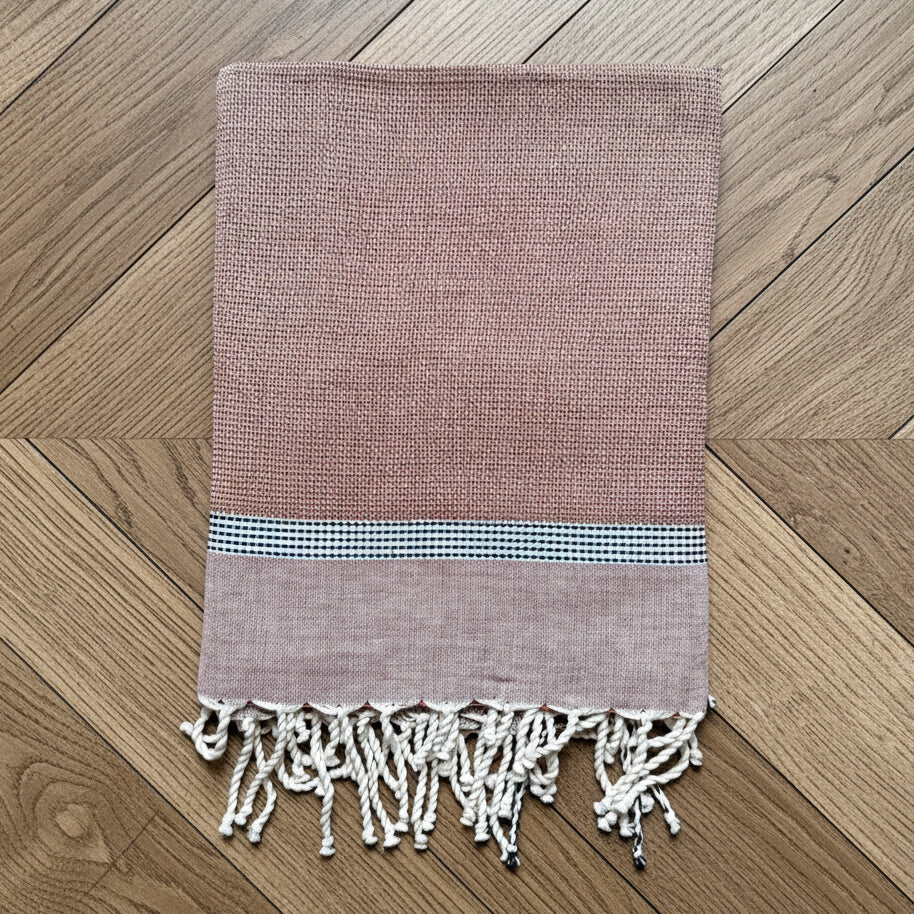 cinnamon/black hand towel