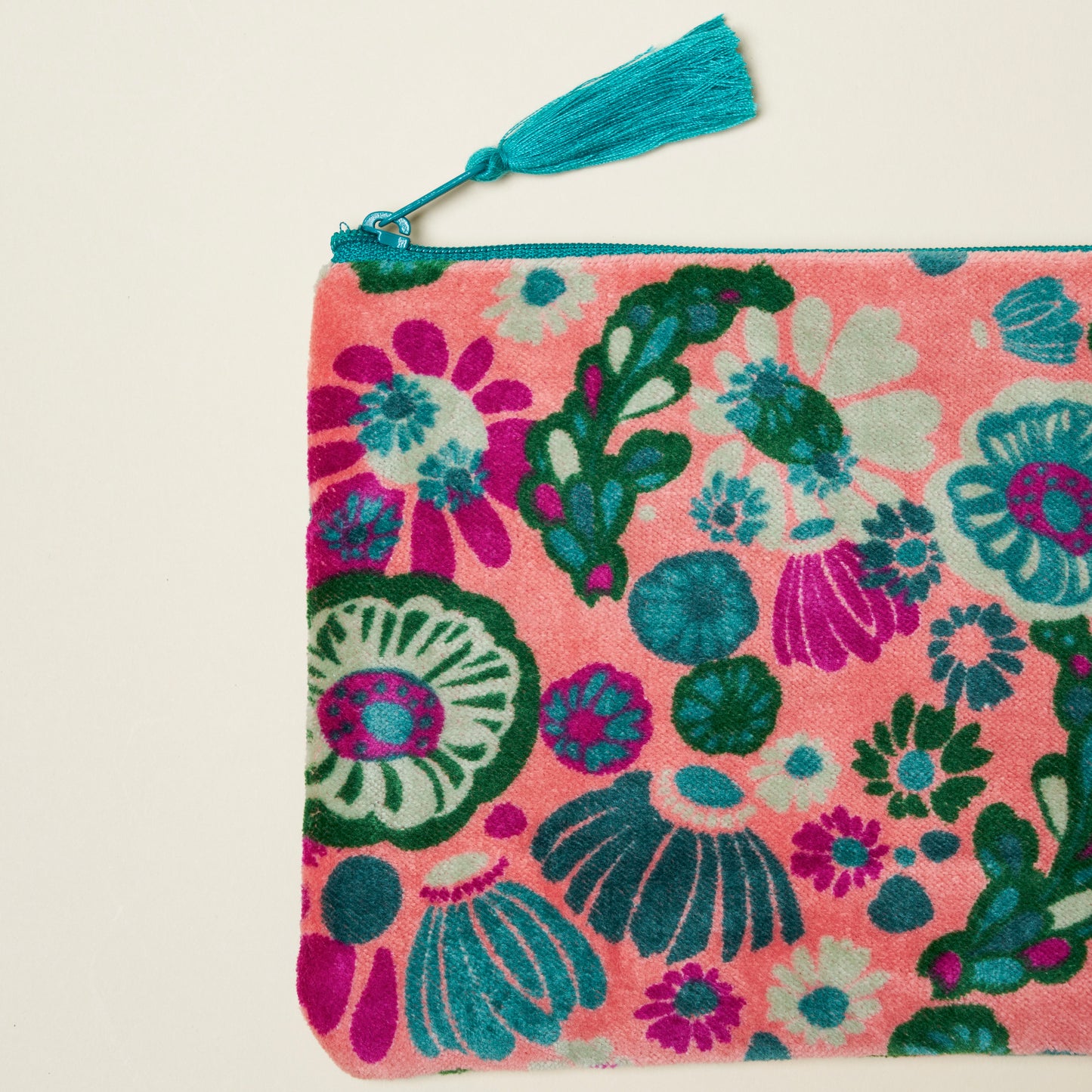 Light pink cotton velvet pouch with a teal, green and magenta floral pattern.