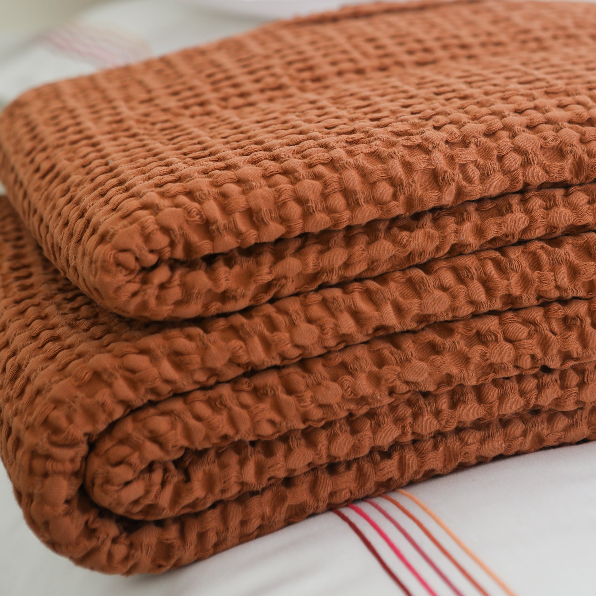 Brick terracotta waffle cottton bedspread.
