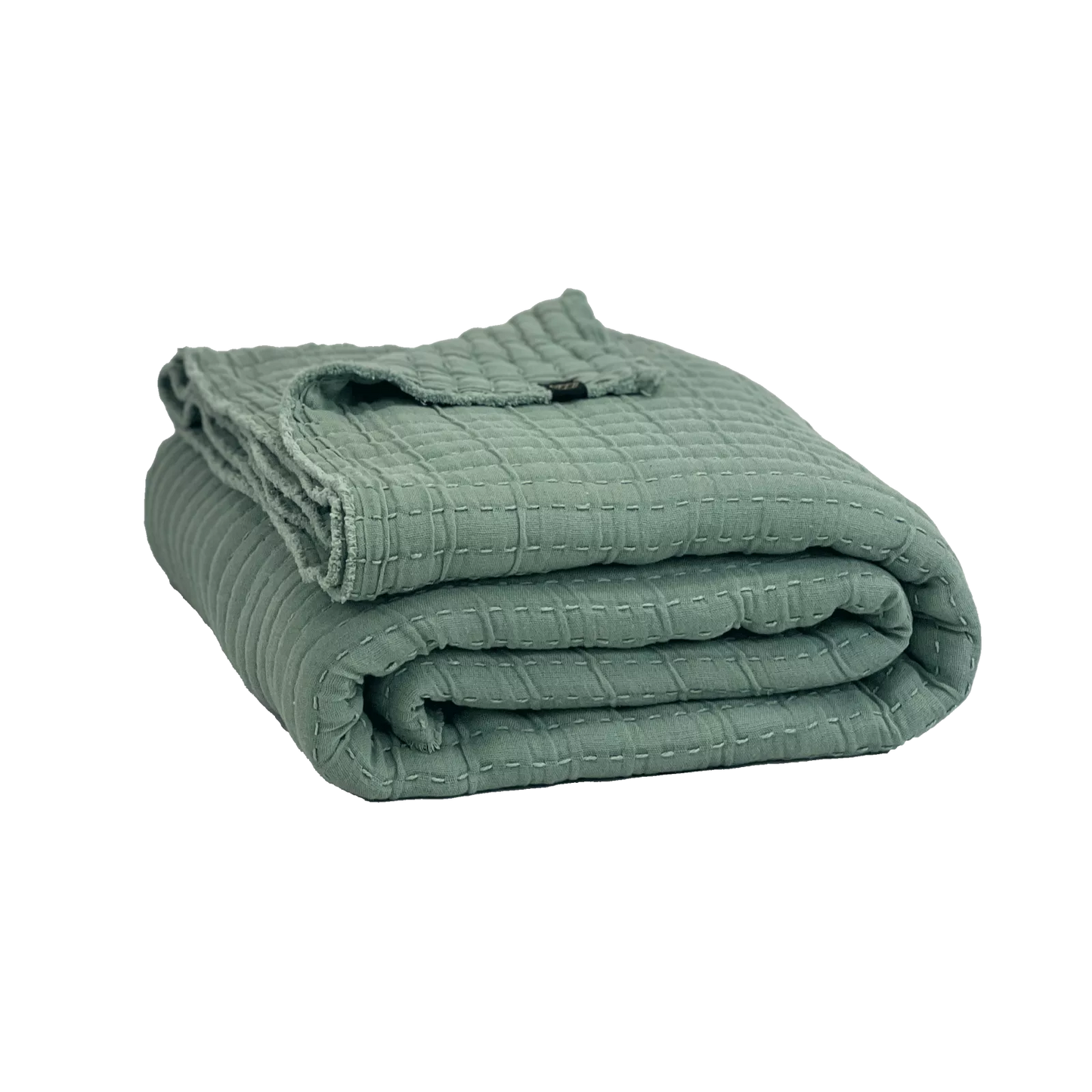 Sage green folded quilted cotton bedspread.