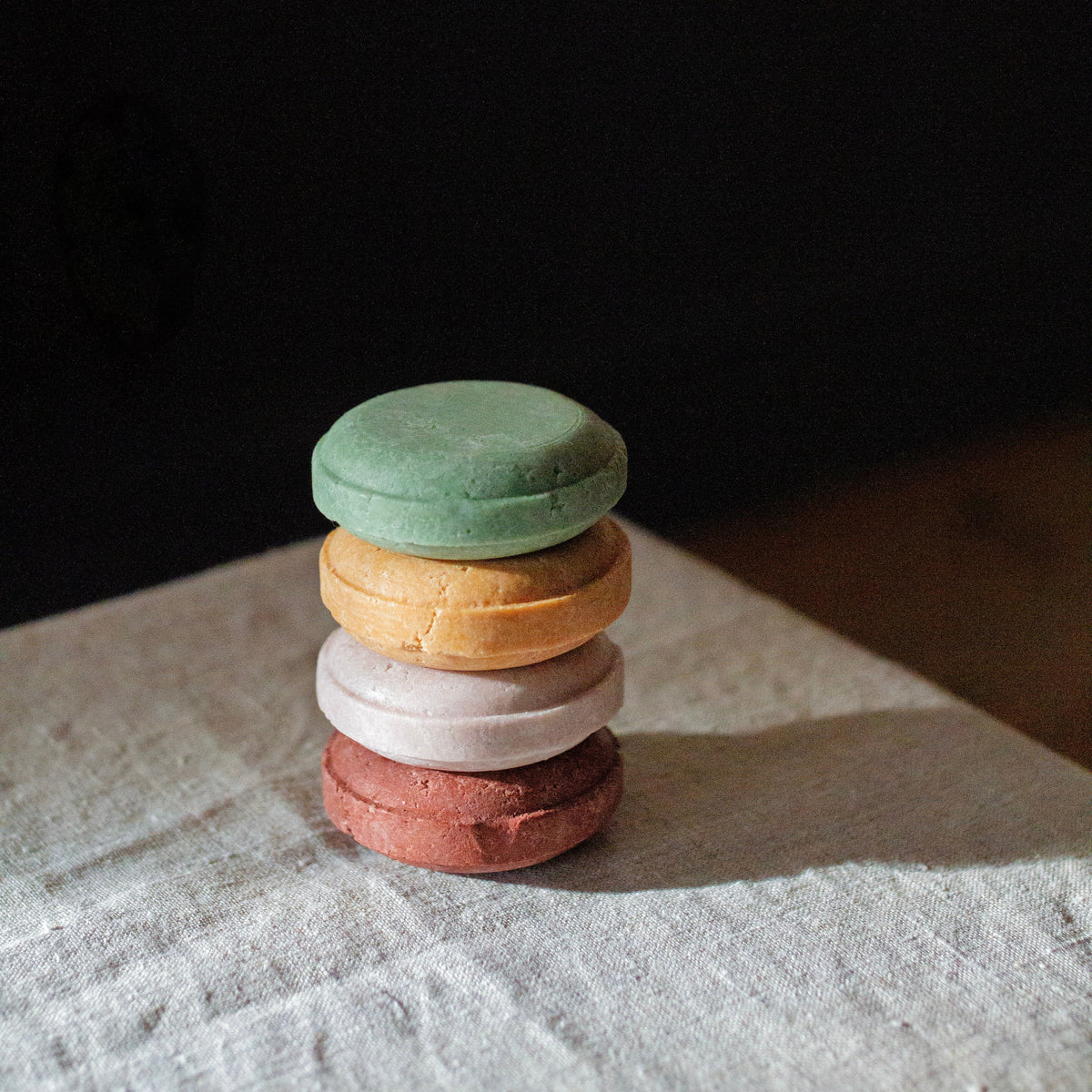 stack of 4 solid shampoo bars