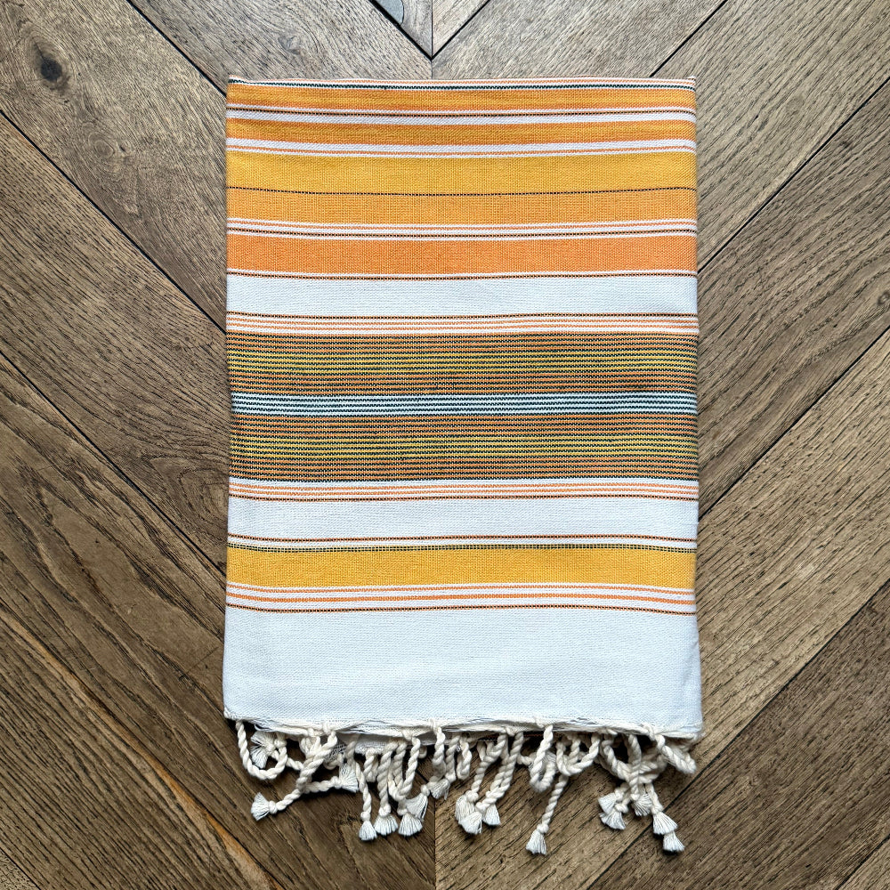 yellow striped beach towel