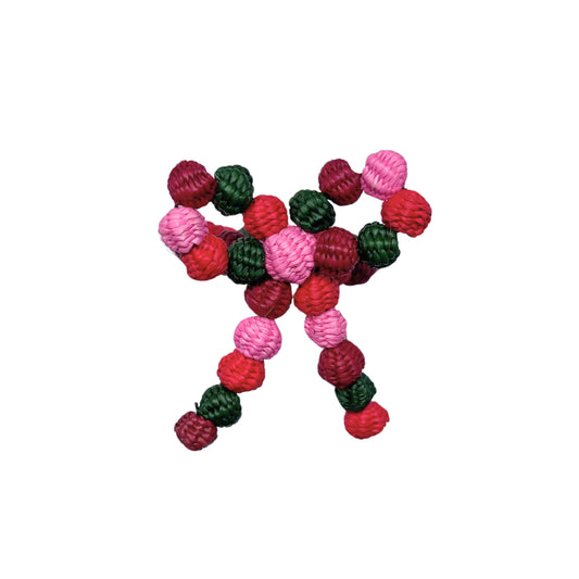 Red, pink and green christmas bow hand-made napkin ring.