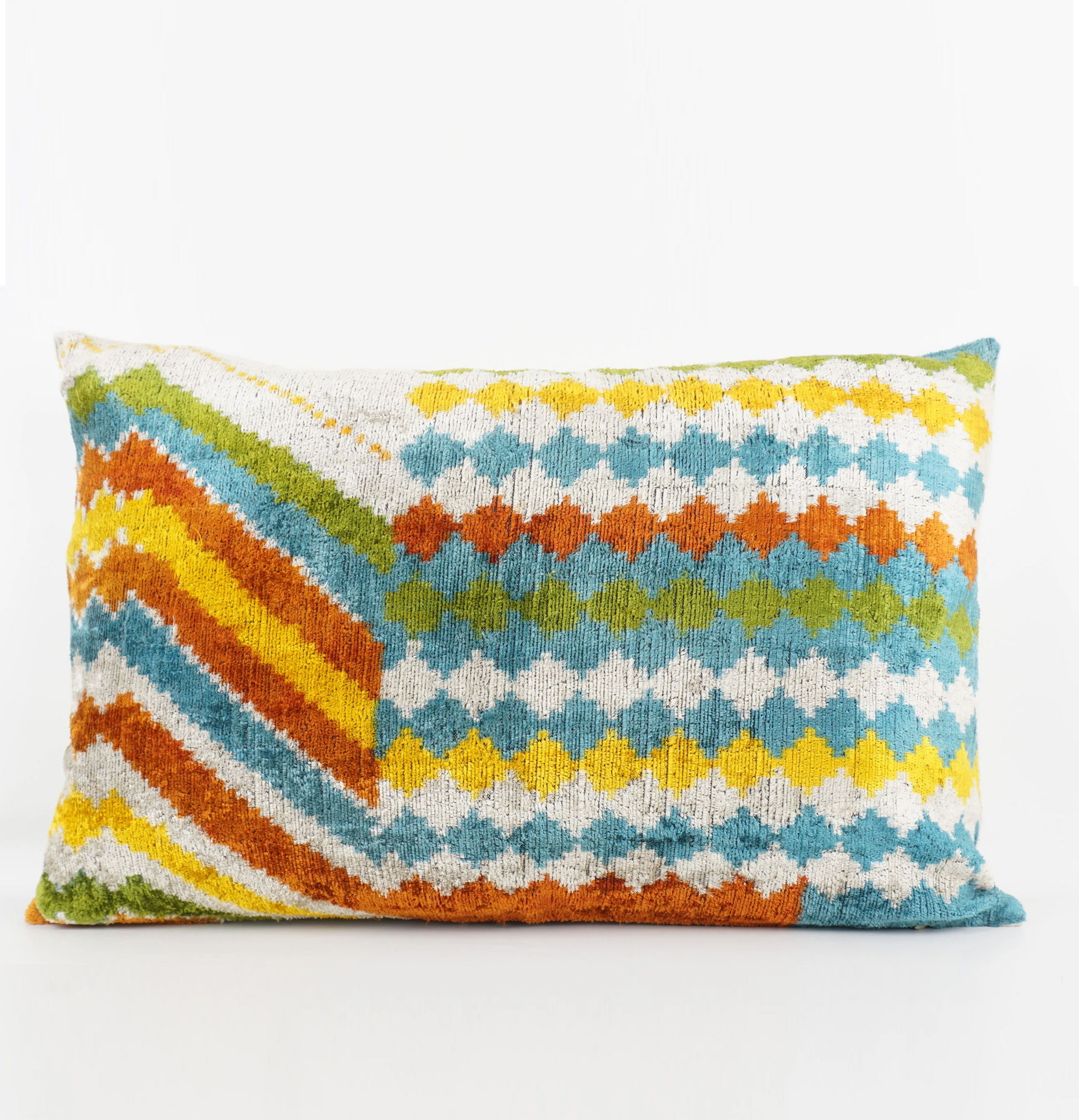 Bright geometric silk velvet cushion with duck feather pad.