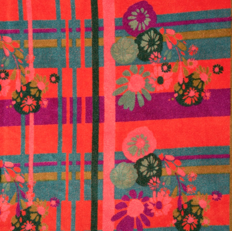 Orange, teal and purple geometric striped and floral designed cotton velvet.