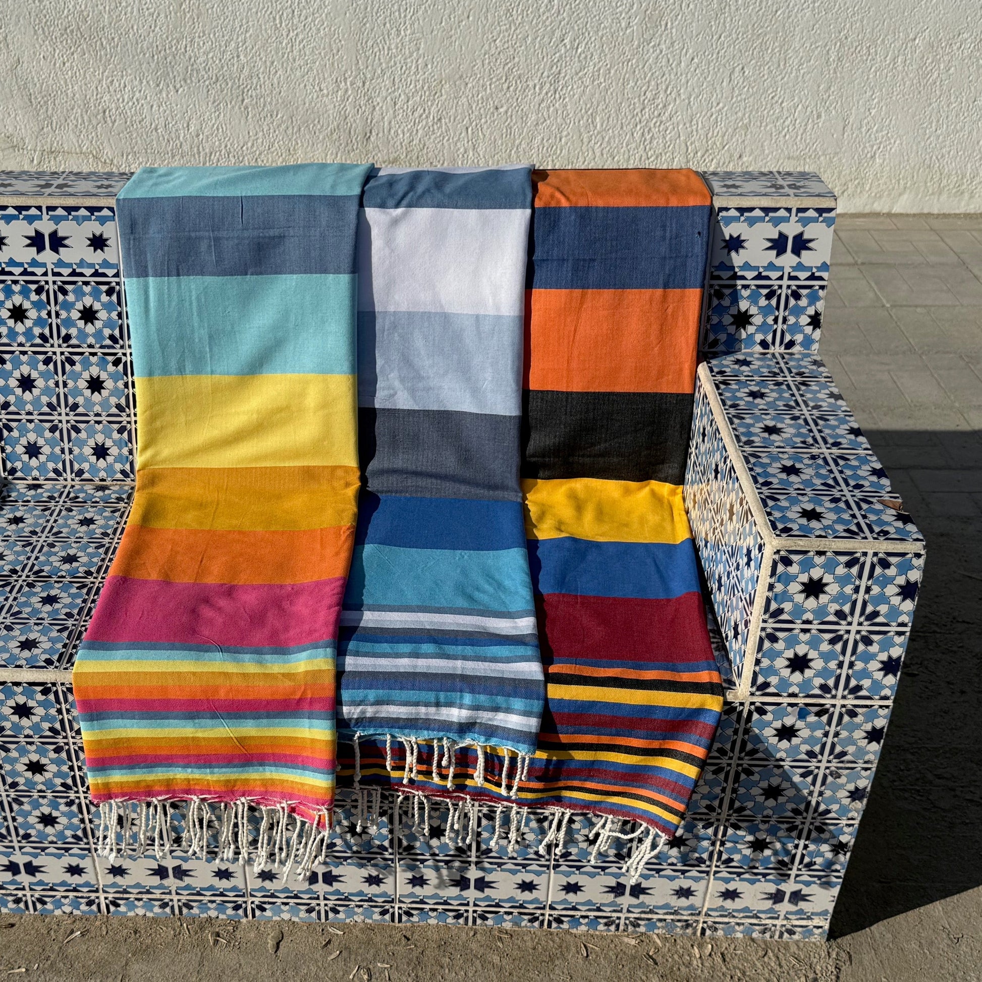Double beach towel range displayed next to eachother.