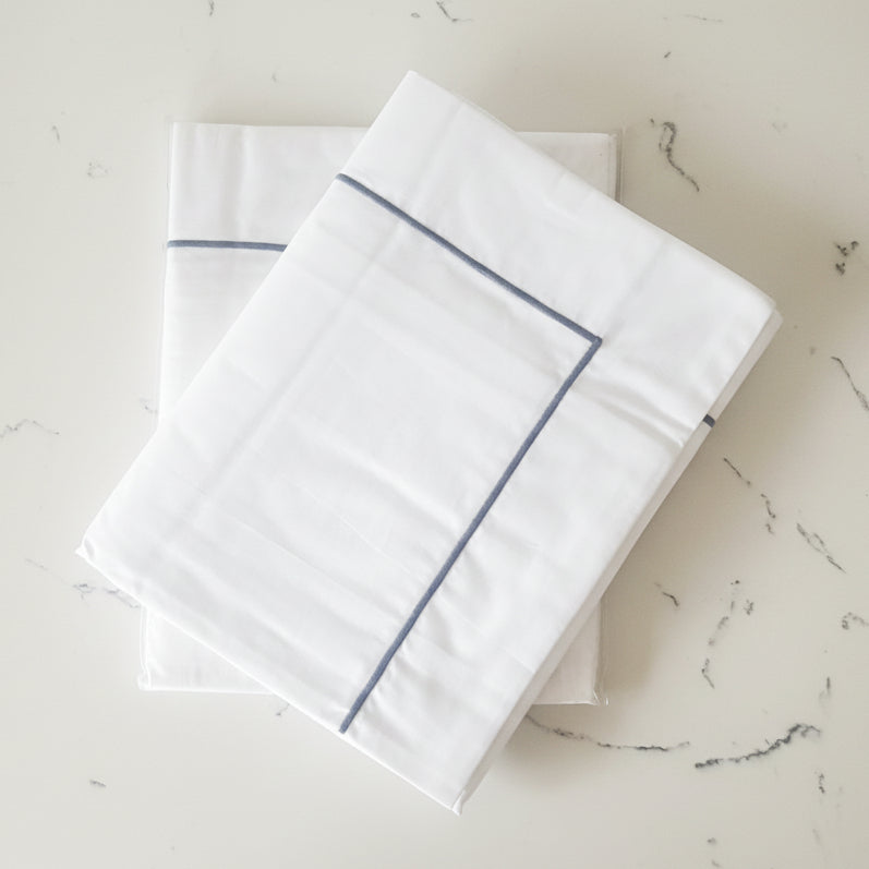 Grey corded detailed white king oxford pillowcases.