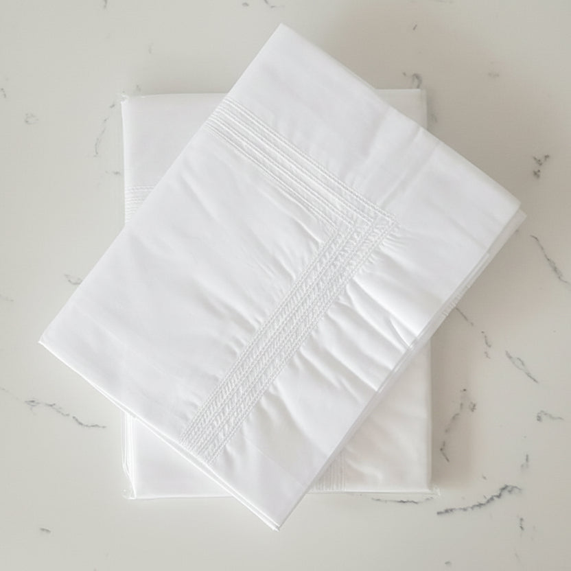 White royale row hemstitched detiled king pillowcases.