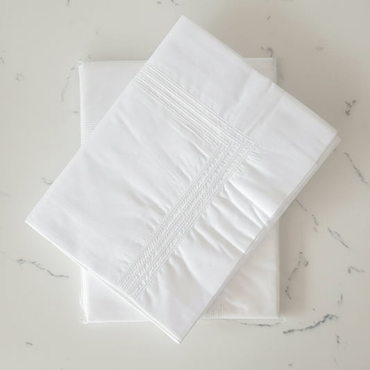 White royale row hemstitched detiled king pillowcases.