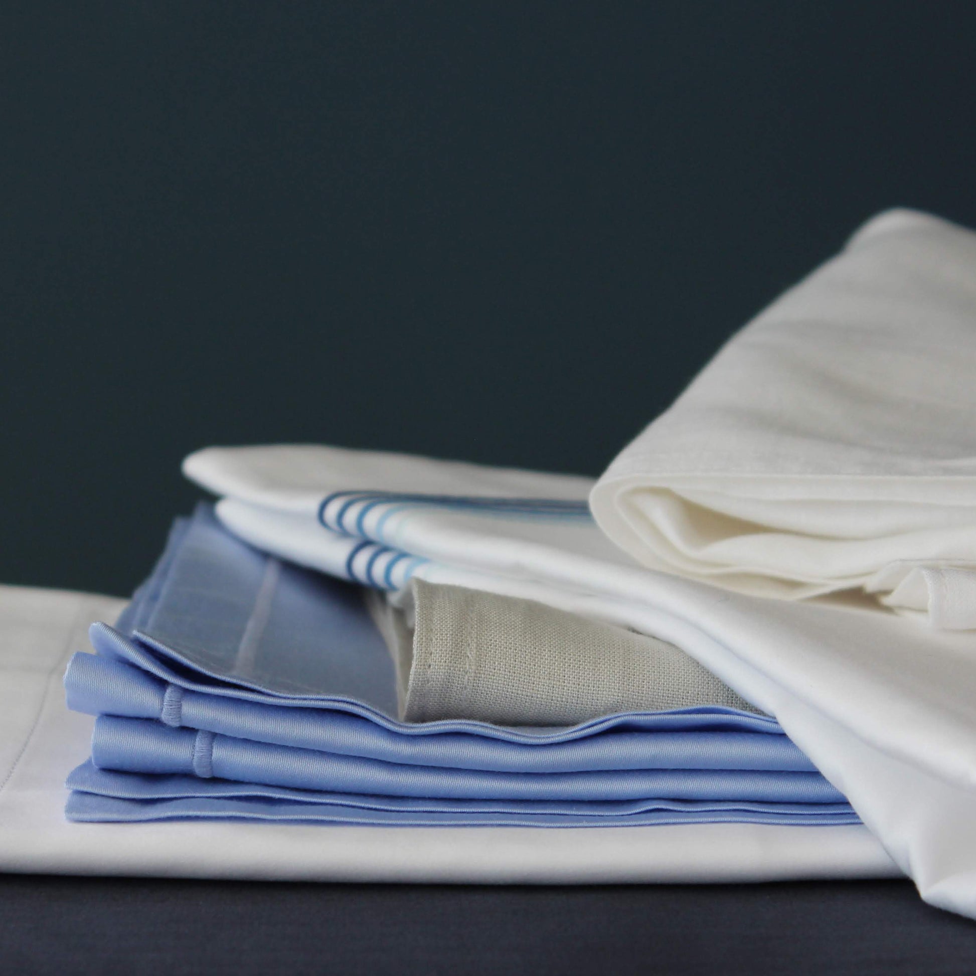 Bristol blue sateen king pillowcase finished with a blue cording border.