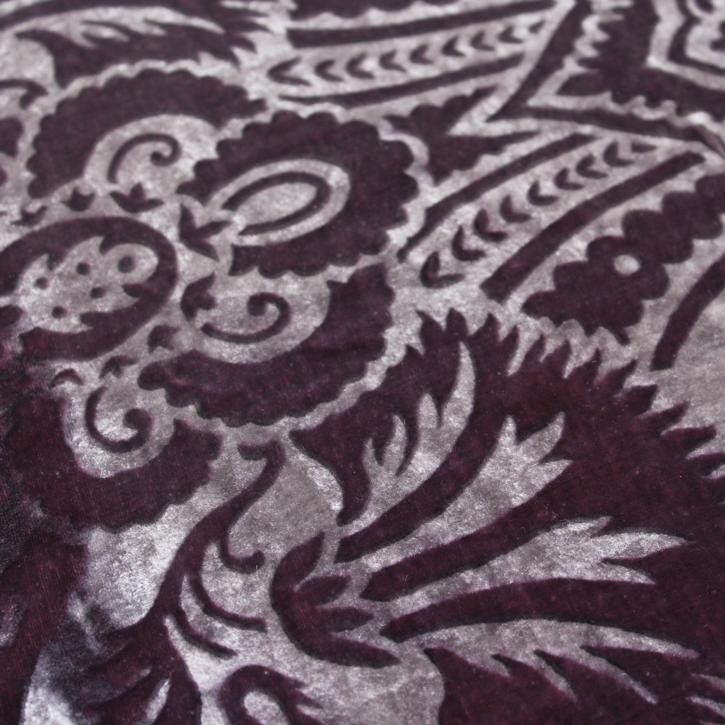 Close up of gaufrage silk velvet cushion showing the pattern in the velvet.