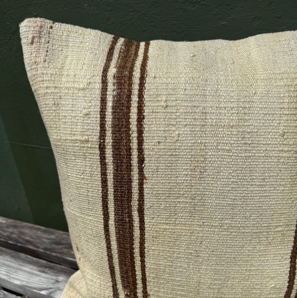 vintage kelim in natural colours made into large square cushion