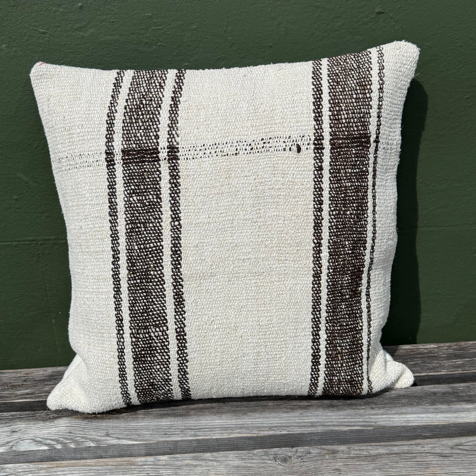 natural wool handwoven into cushion