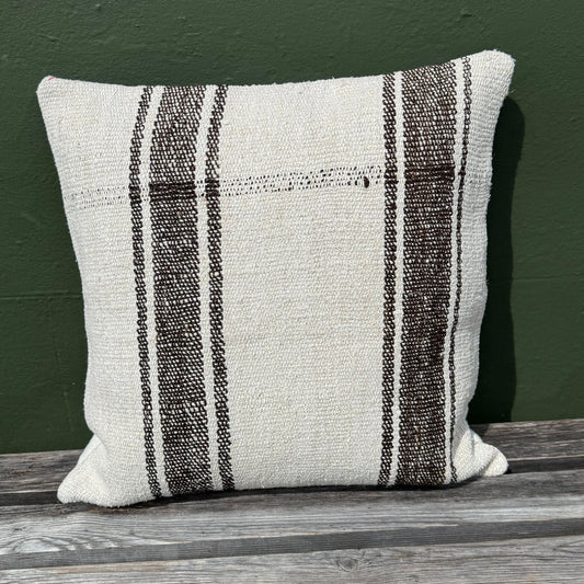 natural wool handwoven into cushion