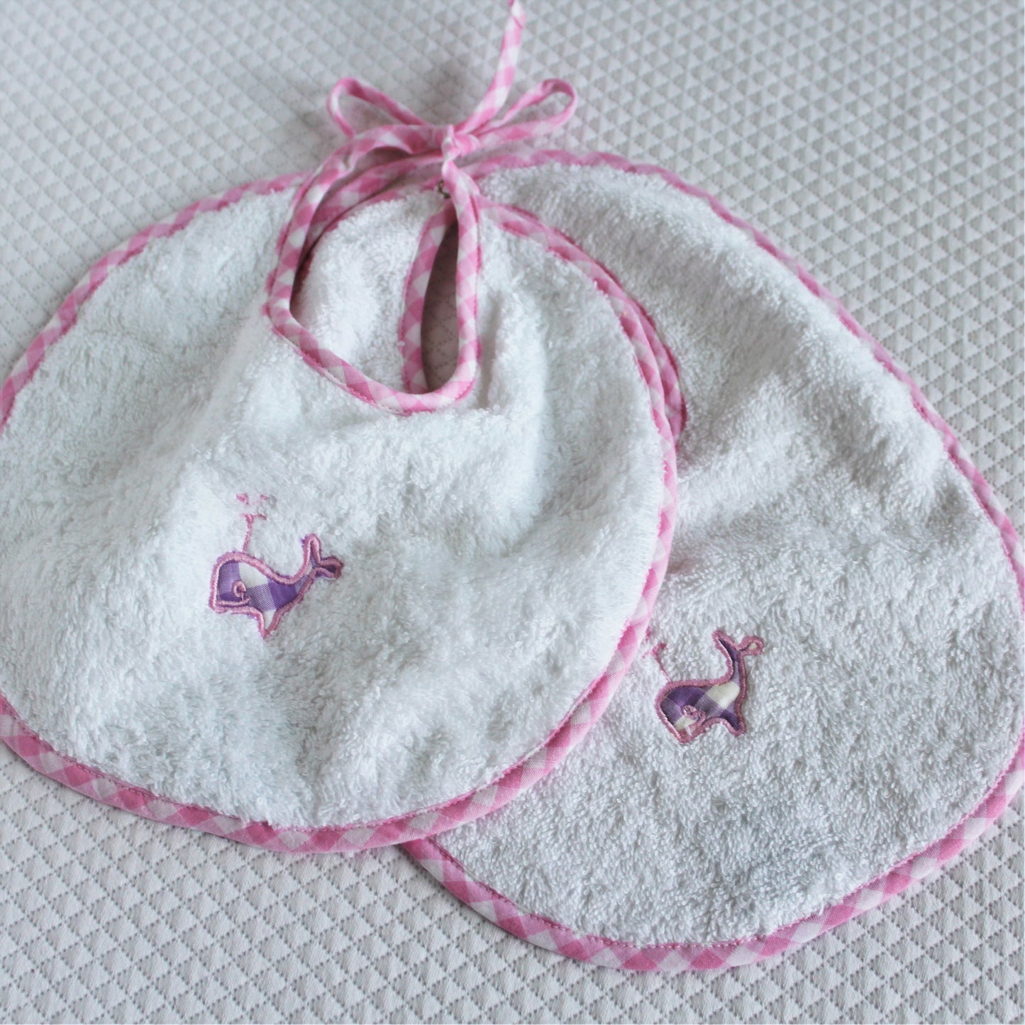 Tradiotional gingham tie bibs with whale motif