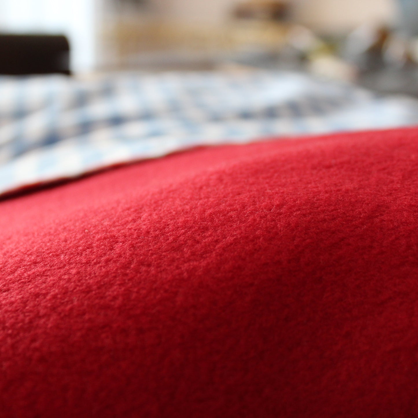 close up of red fleece blanket