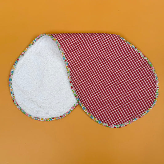 red and white gingham bumper with floral edge and reversing to cotton towelling