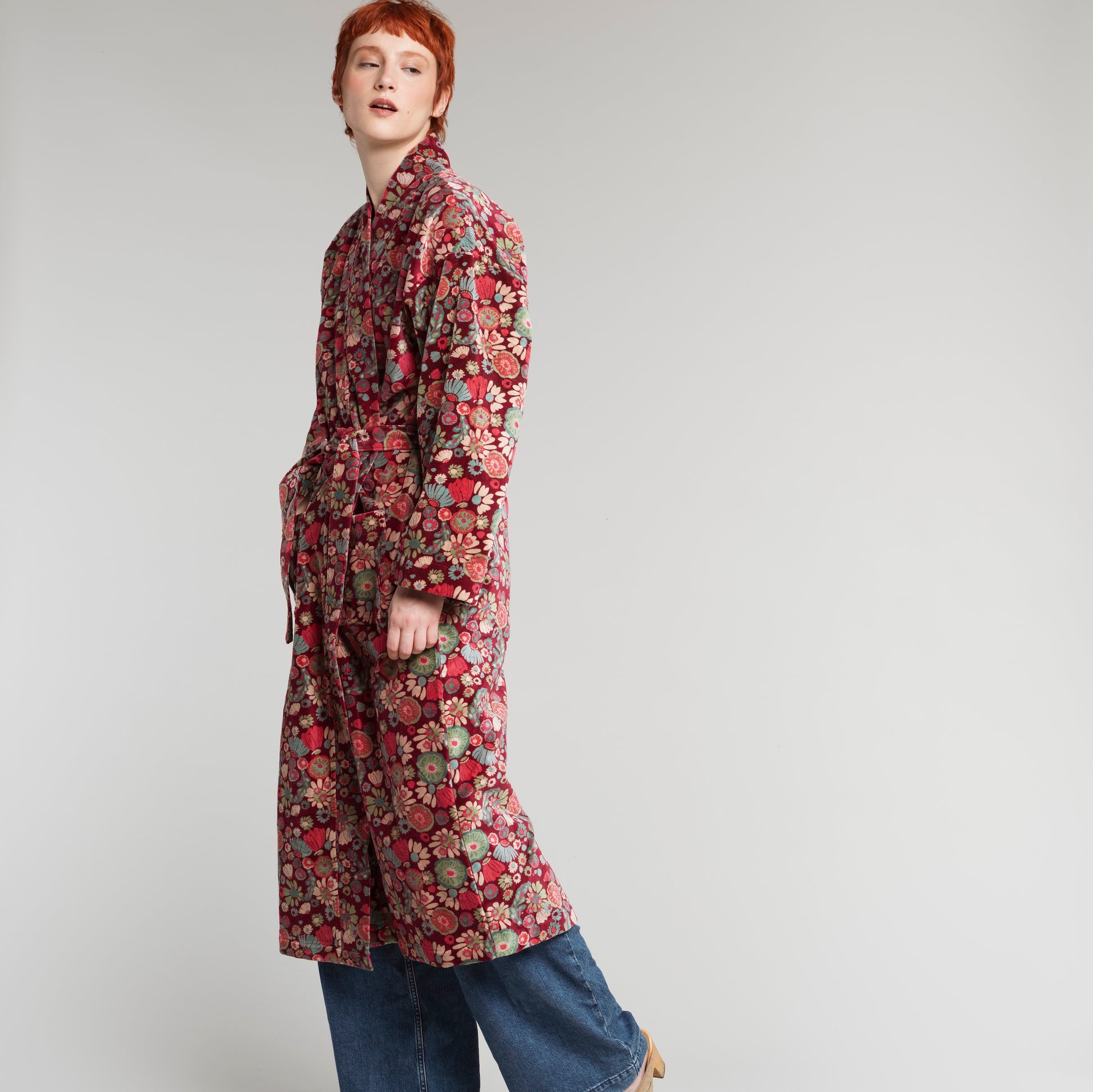 Burgundy cotton velvet robe with magenta, green, teal and cream flower design.