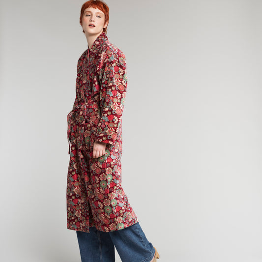 Burgundy cotton velvet robe with magenta, green, teal and cream flower design.