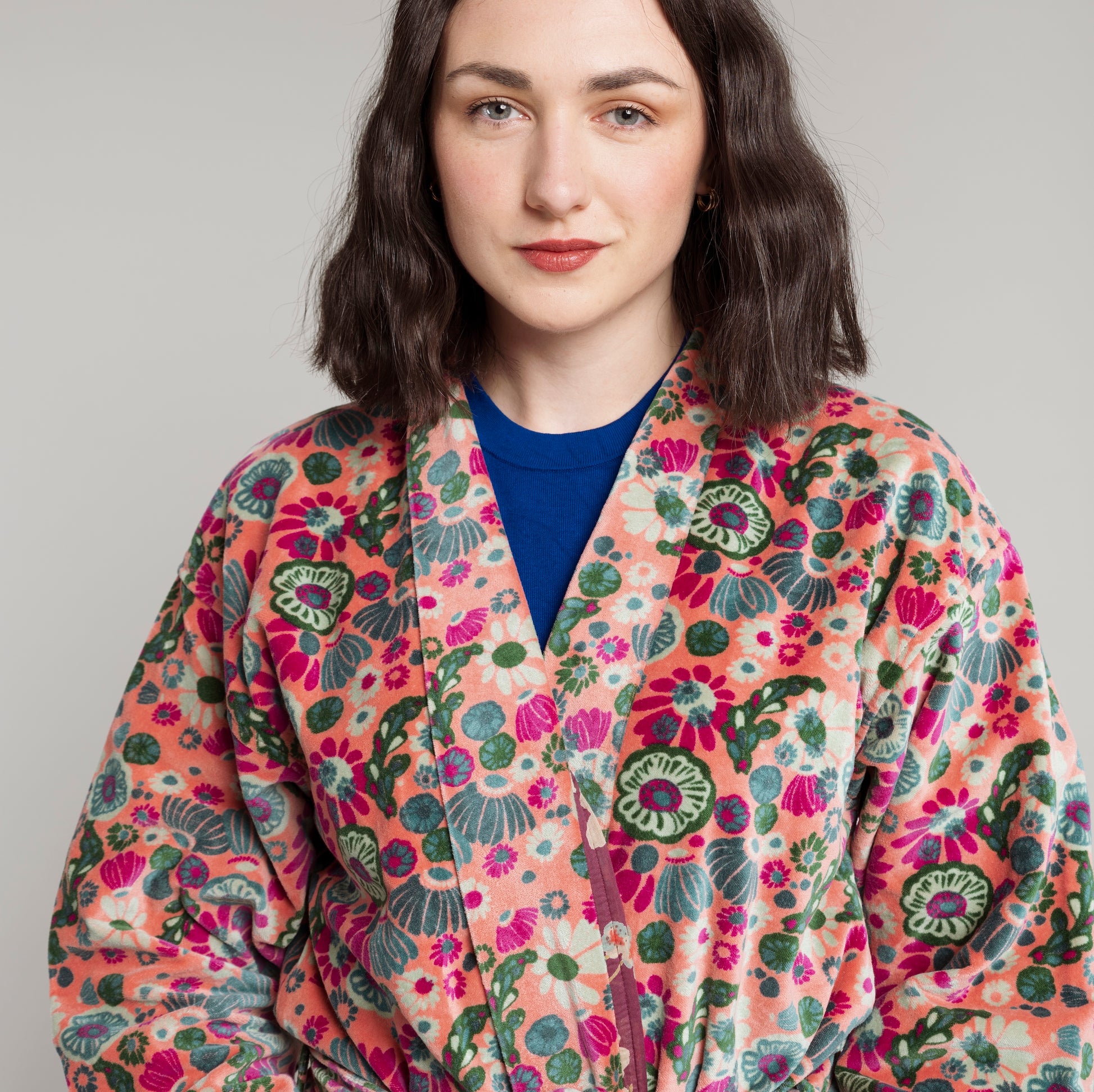 Green, teal and magenta floral designed pink cotton velvet robe.