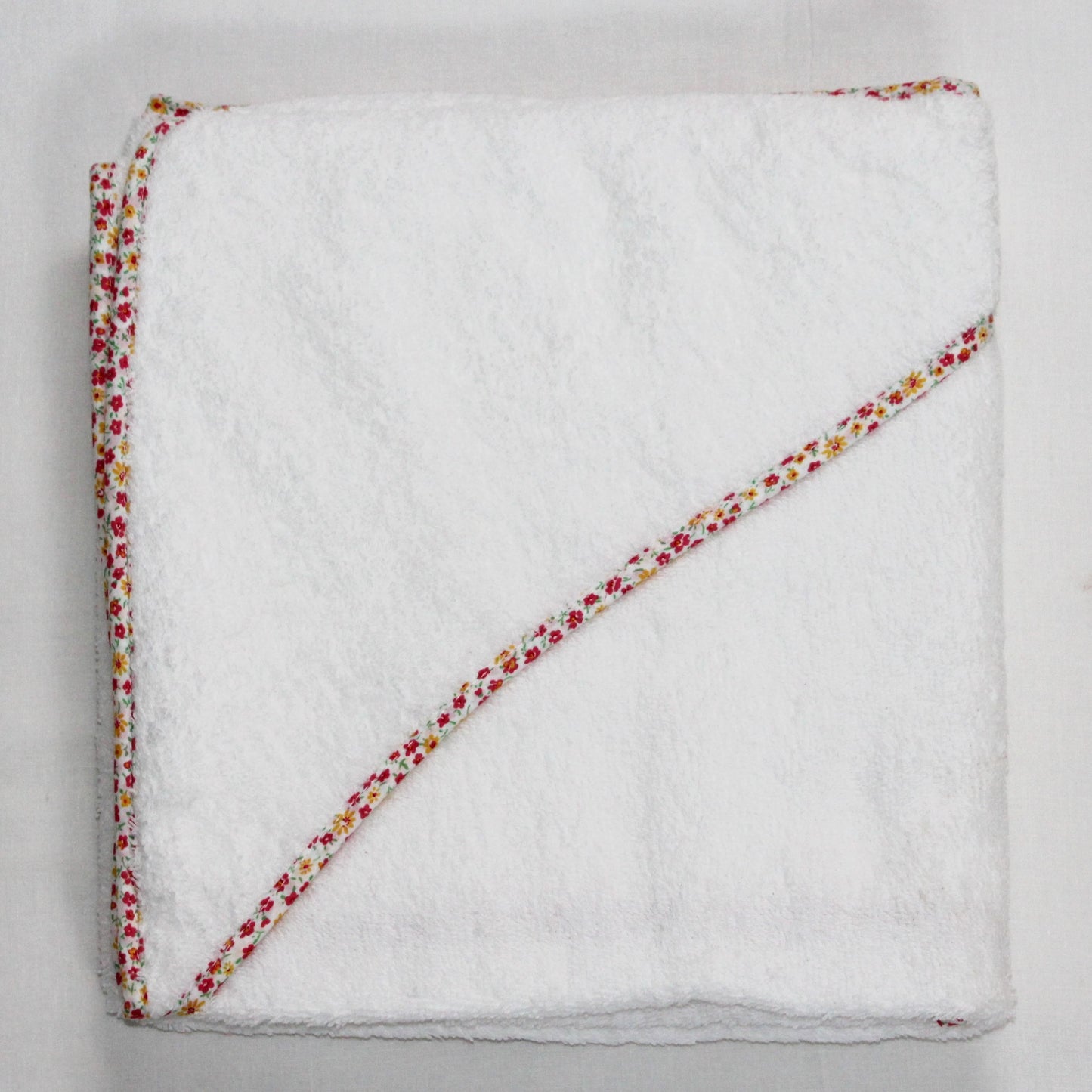 Floral edged hooded baby towel