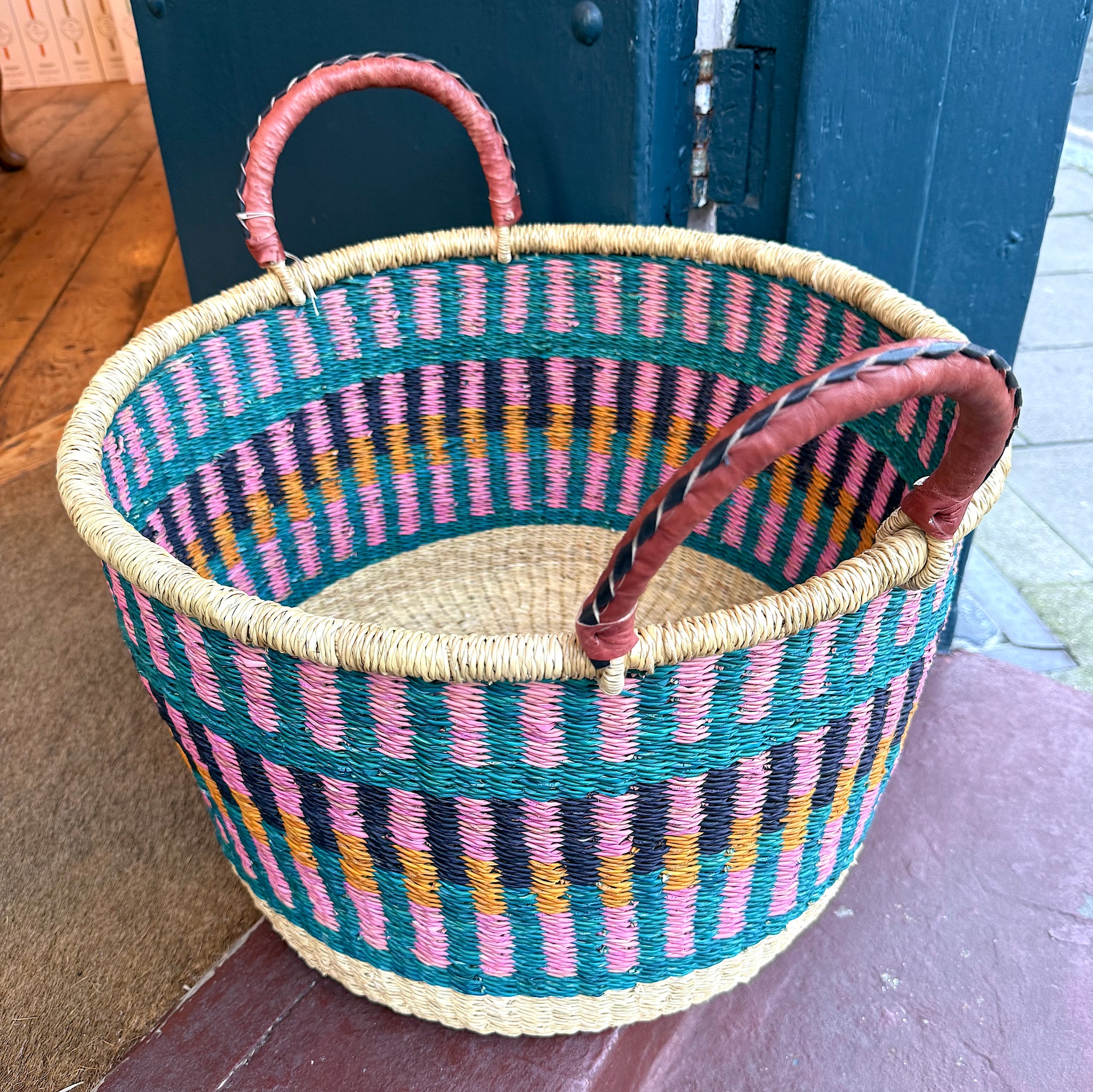 Ghanain storage Basket with leather handles.