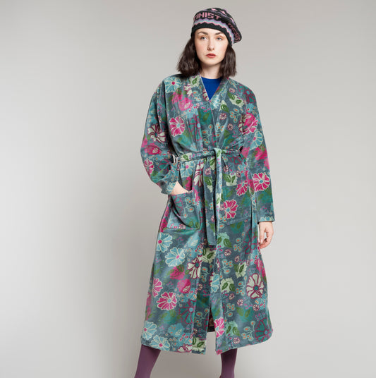 Cotton velvet teal robe with a multi colour floral pattern.