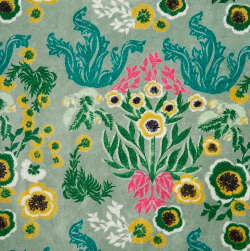 Sage green cotton velvet with a yellow, green and teal wild flower design.