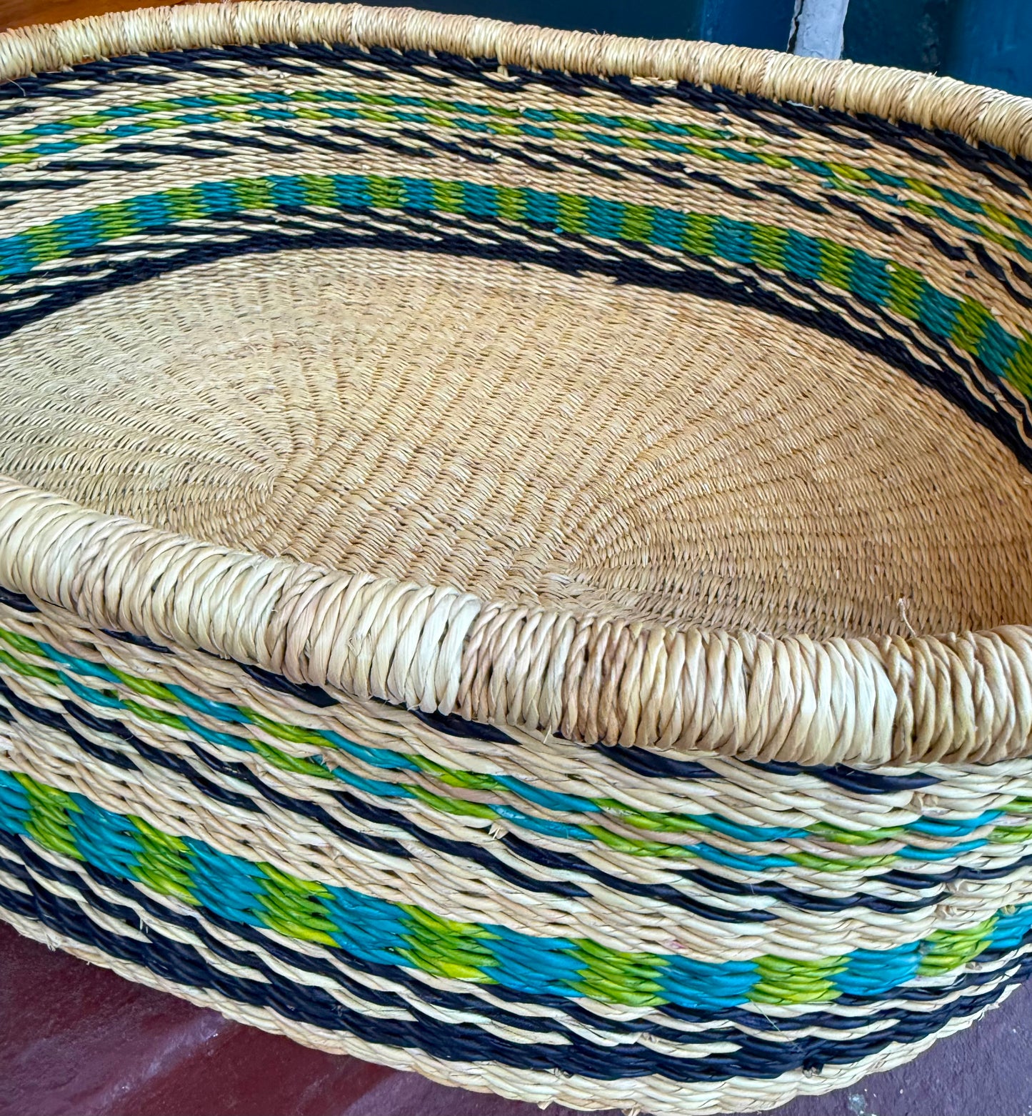Blue and green patterned hand woven tray.