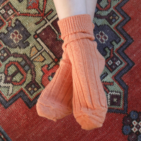 oraqnge bed sosks alpaca