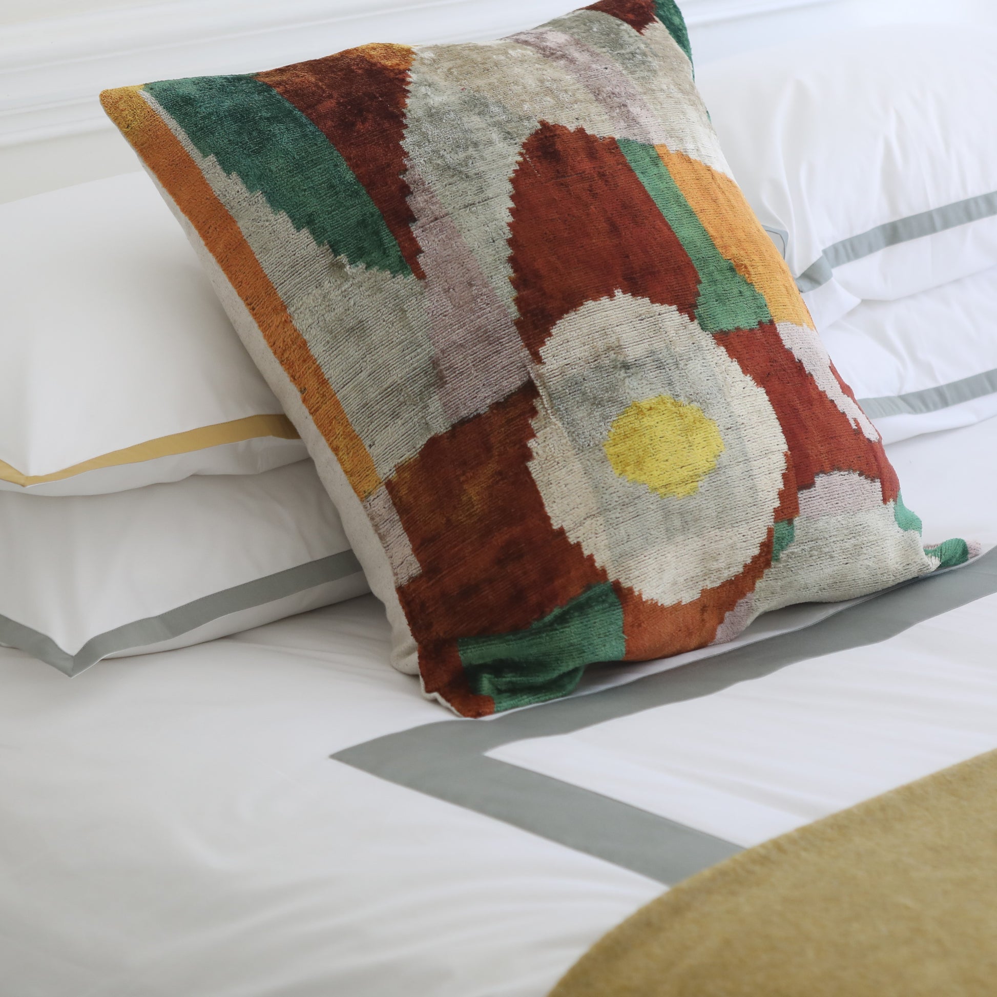 Green and brown abstract large square ikat cushion