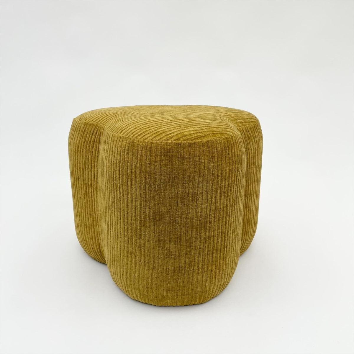 Yellow cord pouffe footstool.
