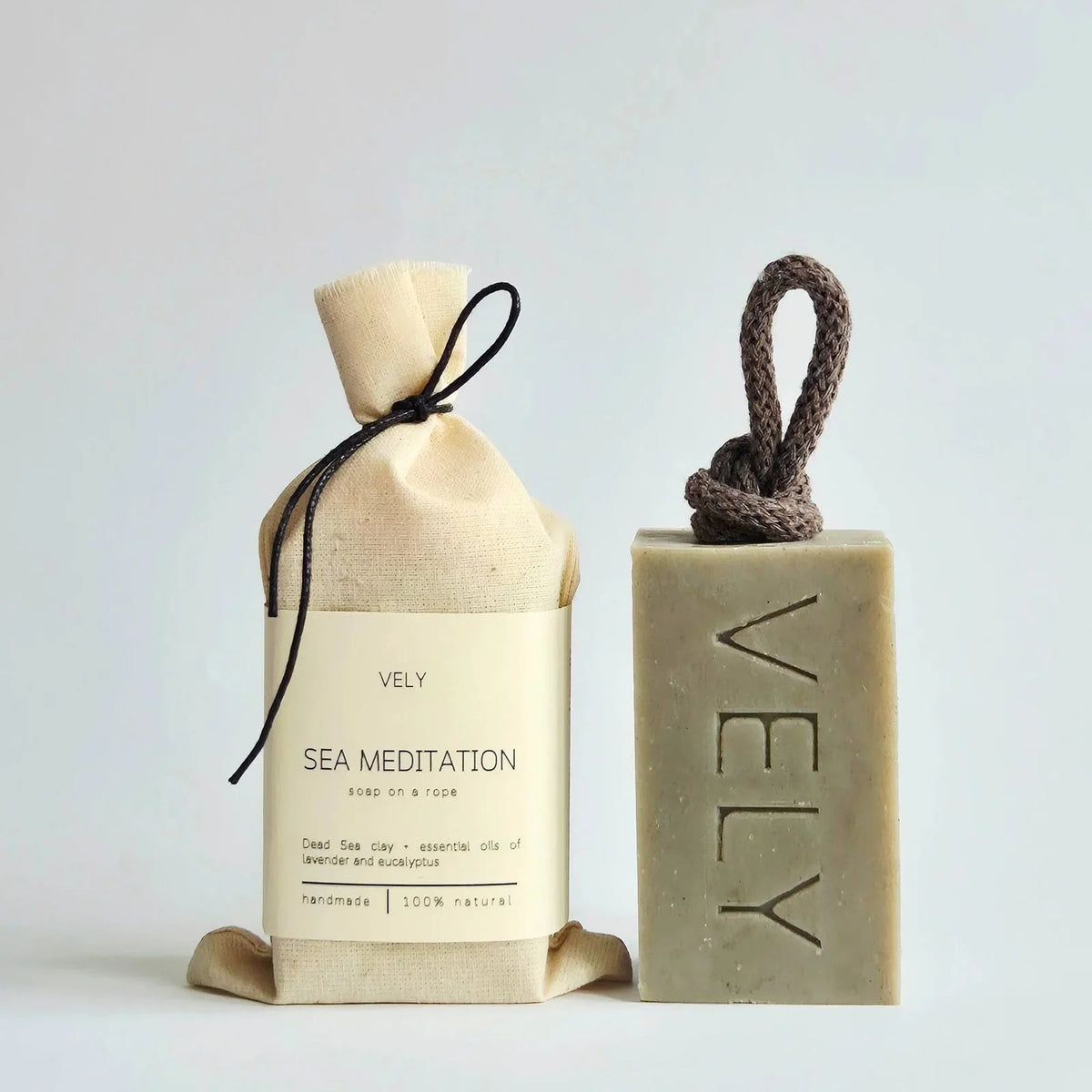 Two VELY soap products on a light gray background