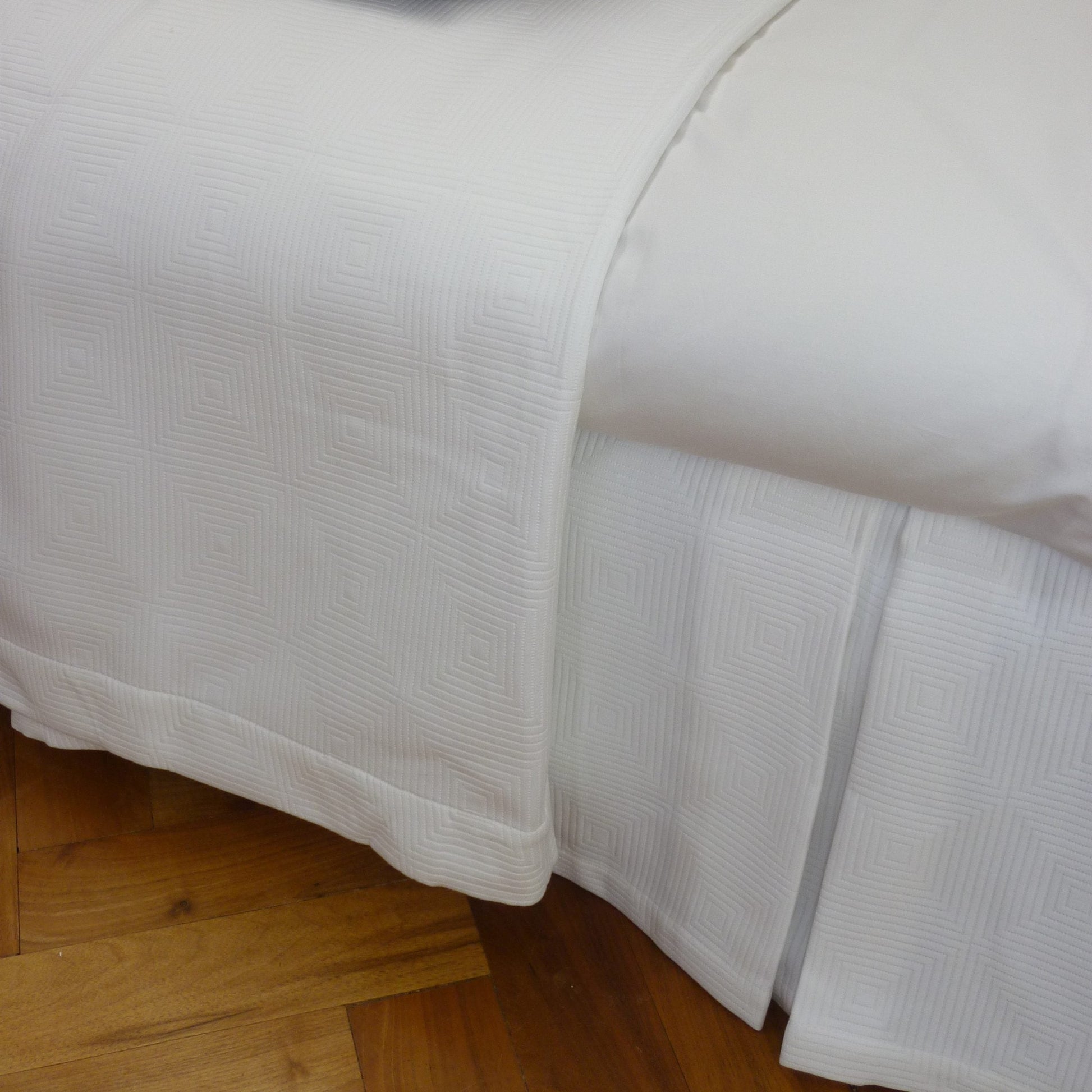 Berlin Mercerised Cotton Bedspread White on Bed