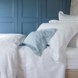 Jasmine White on Bed